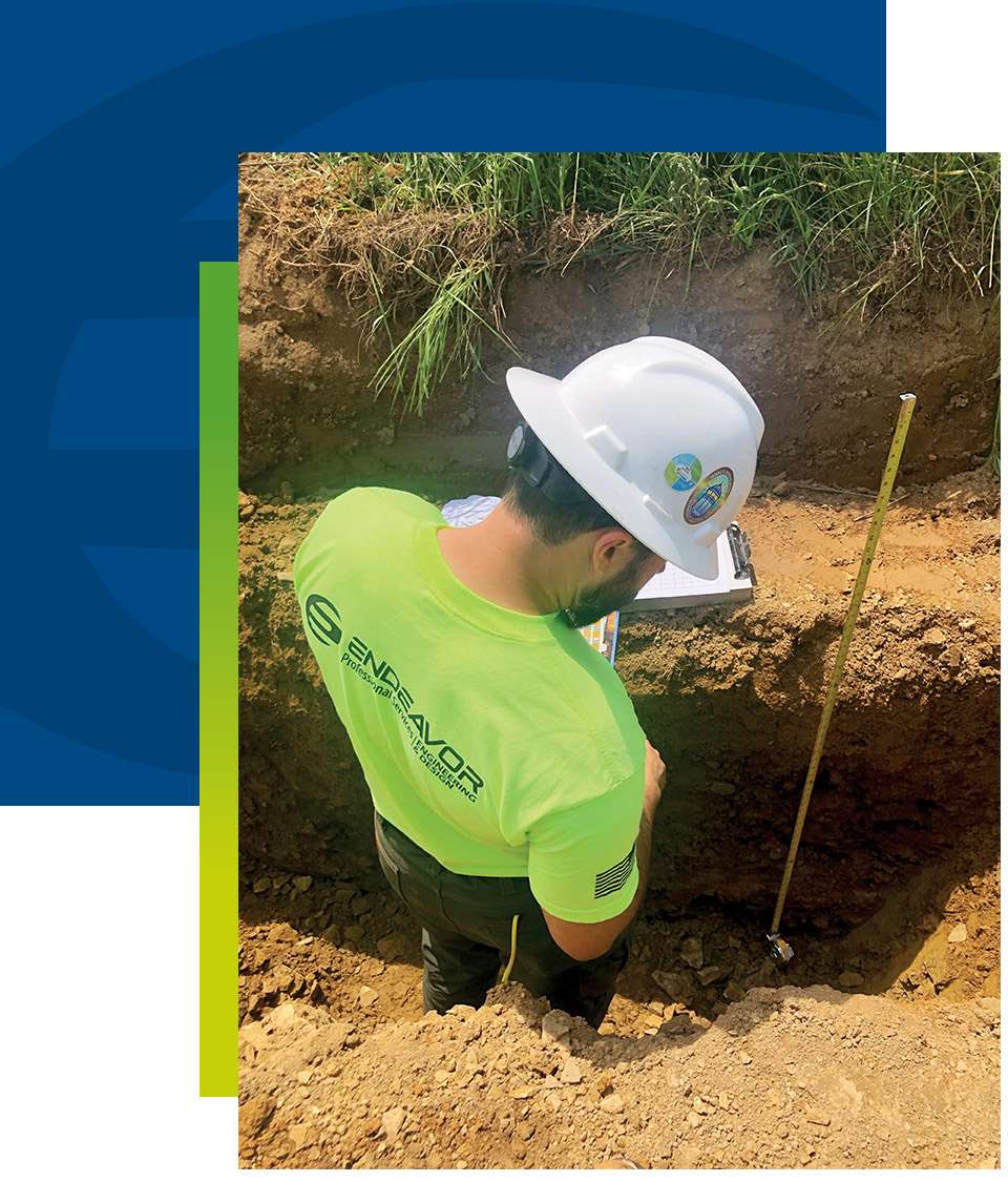 Endeavor-Employee-Surveying-Hole-in-Ground